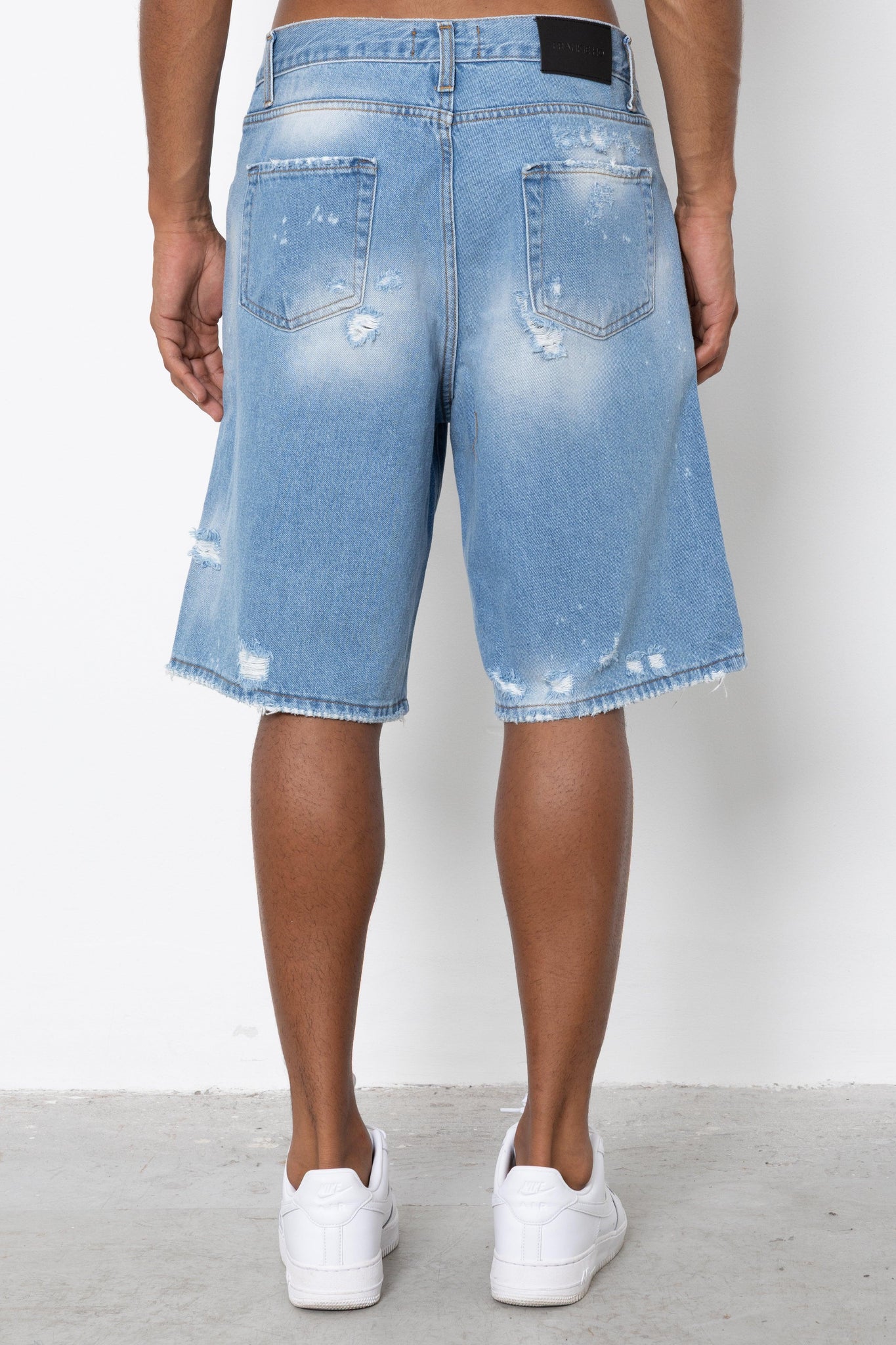 Short jeans light indigo ripped