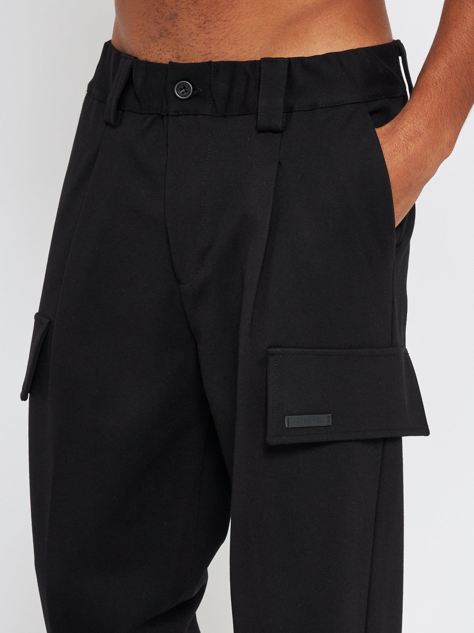 Pantalone cargo con abbottonatura e zip Eternal