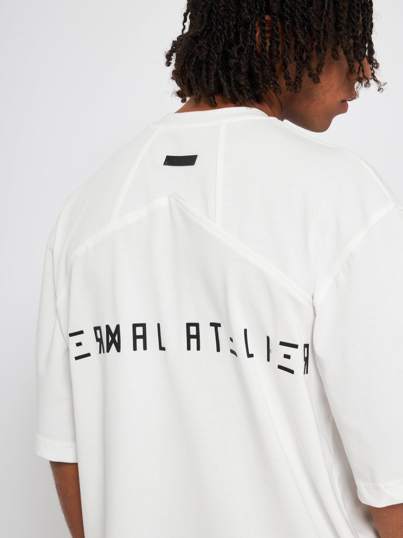 T-shirt con logo gommato Eternal